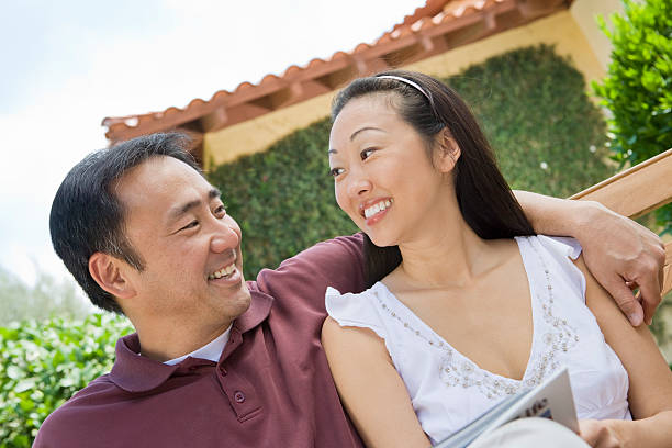 istock Couple relaxing in back yard 535378727