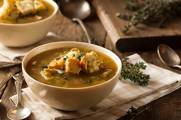 Homemade Split Pea Soup with Croutons and Sour Cream