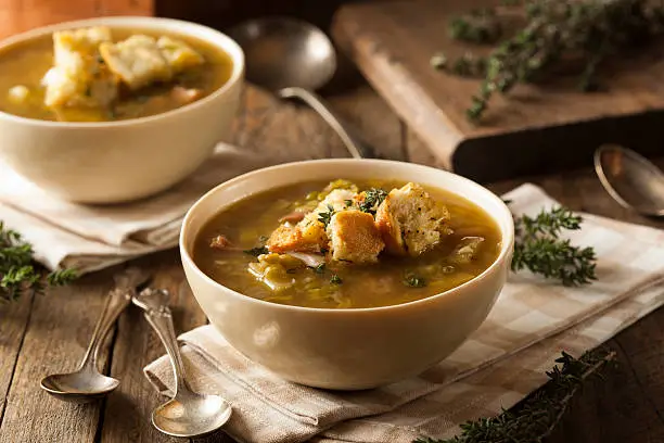 Homemade Split Pea Soup with Croutons and Sour Cream