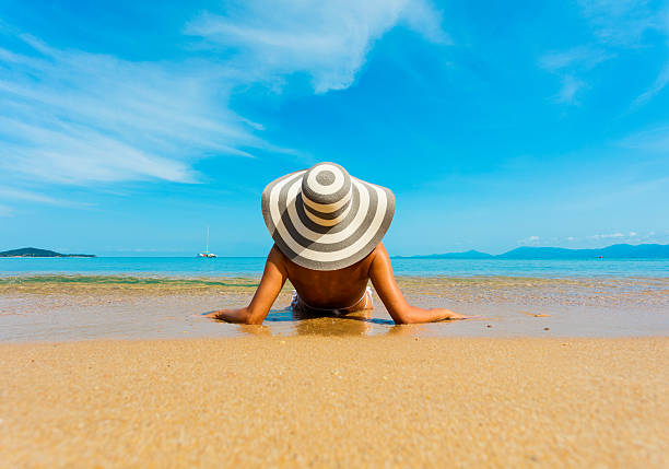 istock Woman at tropical beach 535399010