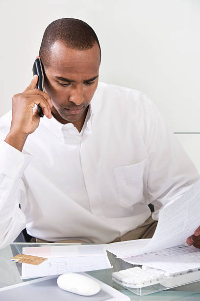 istock Man Paying Bills Through Credit Card 535400149