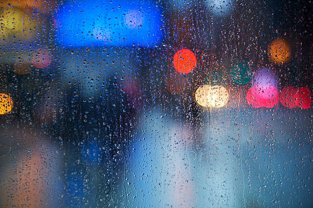 istock Rain drops on the window with traffic light. Toronto 535401030