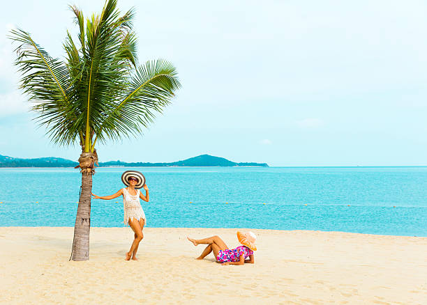 istock woman on a tropical beach 535401062