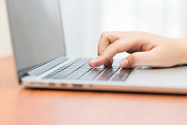 istock Hand on computer keyboard for business concept background (Selec 535401146
