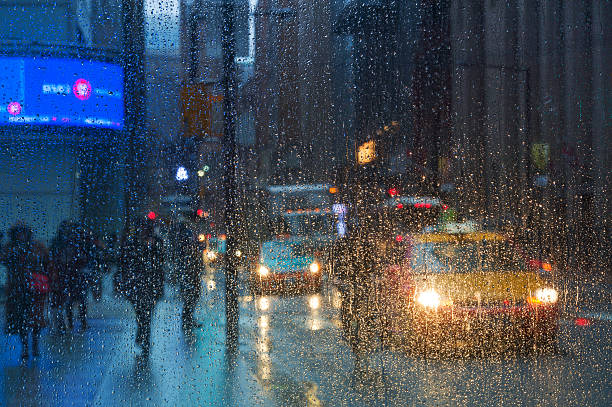 istock Rain drops on the window with traffic light. Toronto 535401716