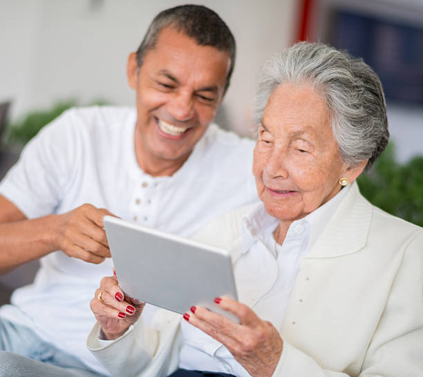 istock Senior woman learning to use a tablet 535401899