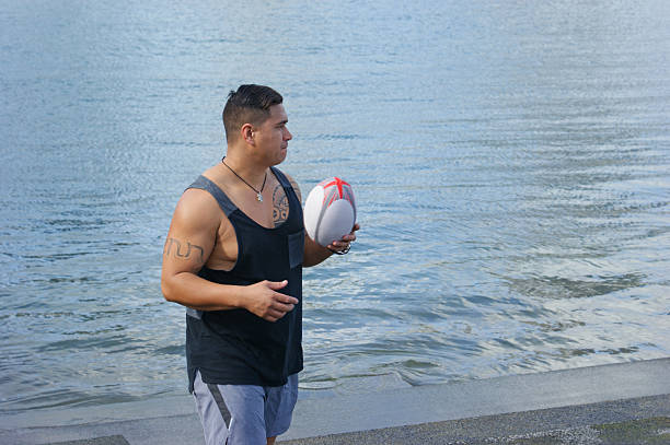 istock Pacific Islander New Zealander playing touch rugby 535402602