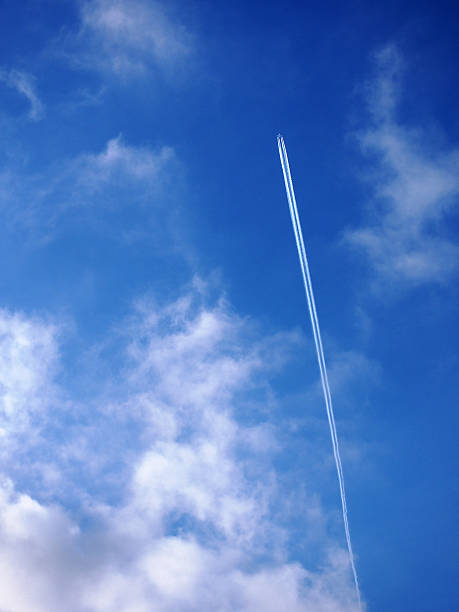 istock Cloud blue sky background and vapor trails, contrails. 535403486