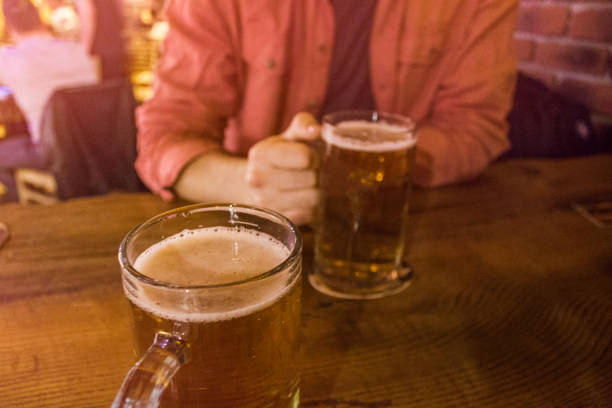 istock friendship concept - friends drinking beer 535404230