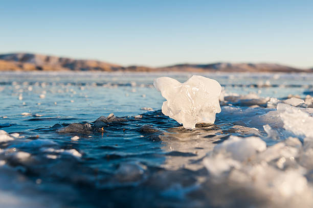istock Beautiful ice on the lake at sunset 535404395