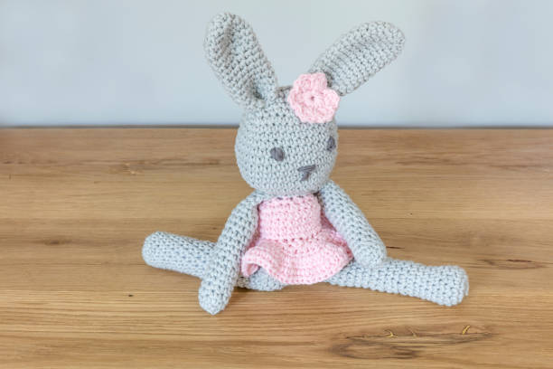 istock Handmade Crochet Toy Rabbit Sitting In Ballet Pose 535405658