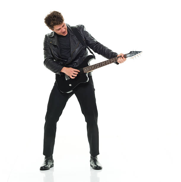 istock Smiling casual man playing guitar 535406092