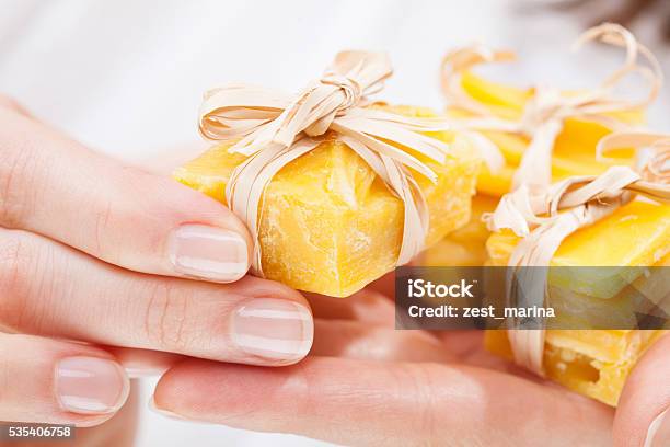 Woman Hands Holding Pieces Of Beeswax Stock Photo - Download Image Now - Candle, Beauty, Beauty Product