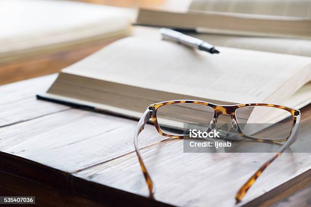 Education Concept Stock Photo - Download Image Now - Eyeglasses, Table, Reading Glasses