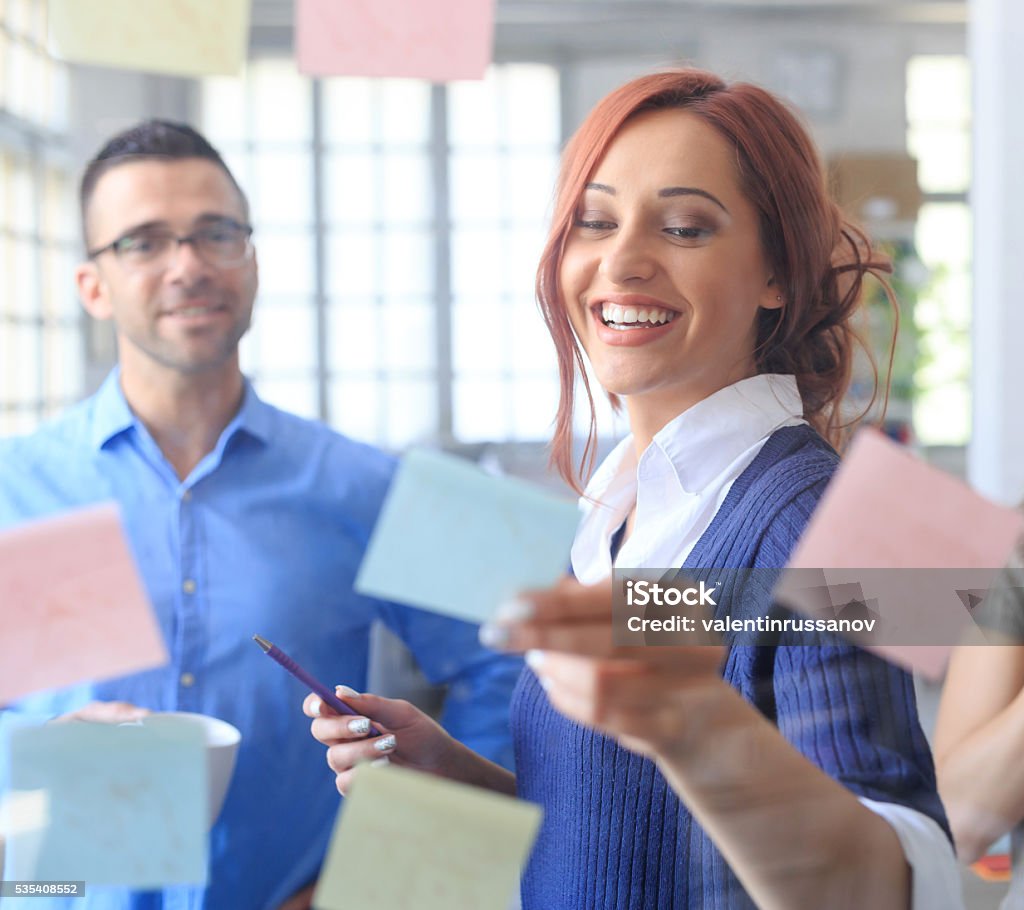 Sticky Notes Person Young People Using Sticky Notes Stock Photo - Download Image Now ...