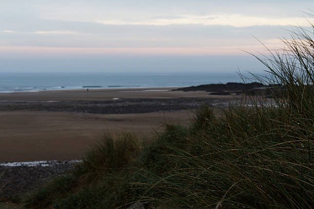 istock View from the sand dunes at first light 535410602