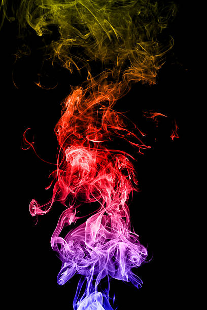 istock Abstract colorful smoke on black background 535410634