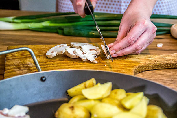 istock Coarsely chopped mushrooms in a frying pan 535410652
