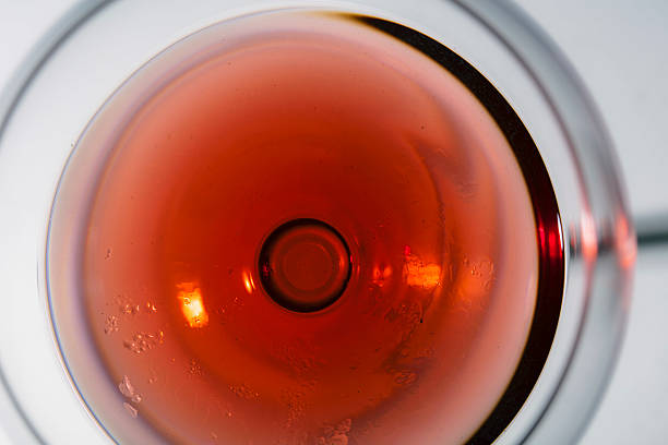 istock Red wine on a wineglass abstract scene 535412448