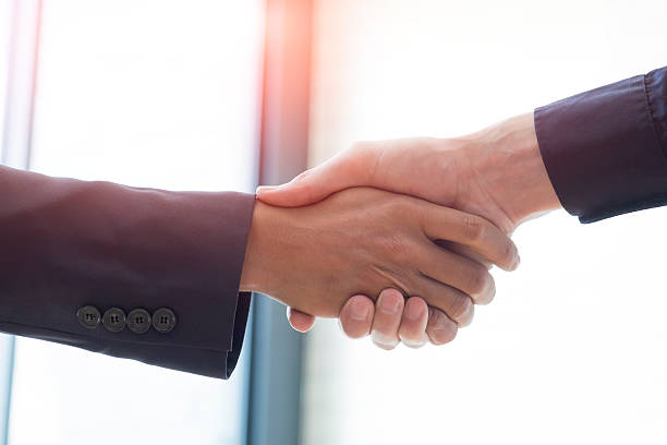 istock Businessmen handshake. 535413760