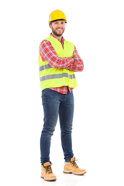 sonriendo trabajador manual. - construction worker building contractor craftsperson full length fotografías e imágenes de stock