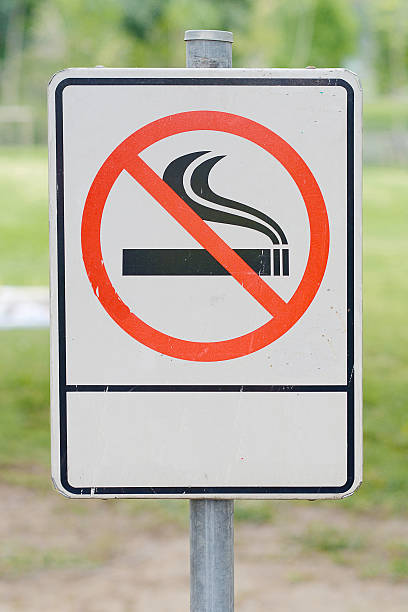 istock Label no smoking metal sign in the park 535414151