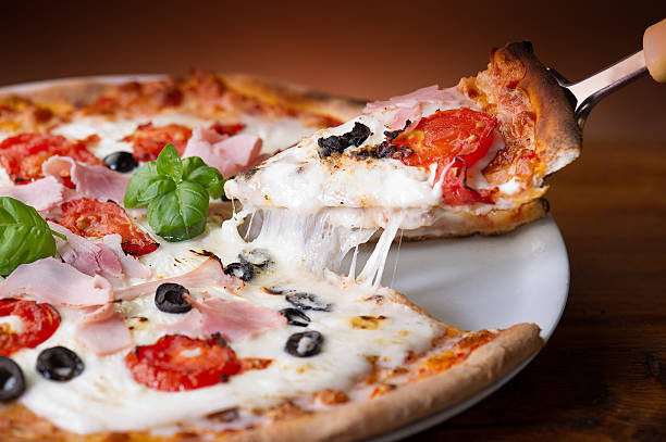 istock pizza with ham and mushroom 535414635