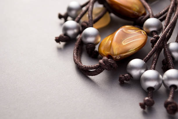 istock Close up of assorted silver and stone beads 535416096