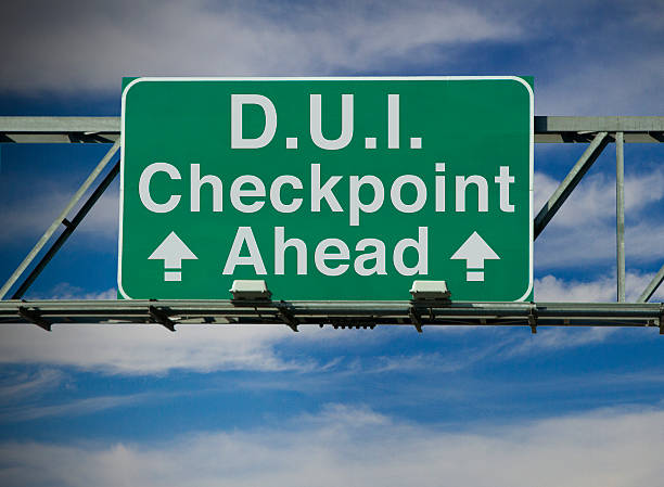 D.U.I. Checkpoint Ahead A road sign concept that says "D.U.I. Checkpoint Ahead." driving under the influence stock pictures, royalty-free photos & images