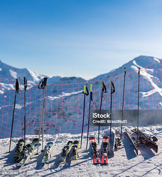 Skis And Poles Stock Photo - Download Image Now - 2015, Alpine Skiing, Back Lit