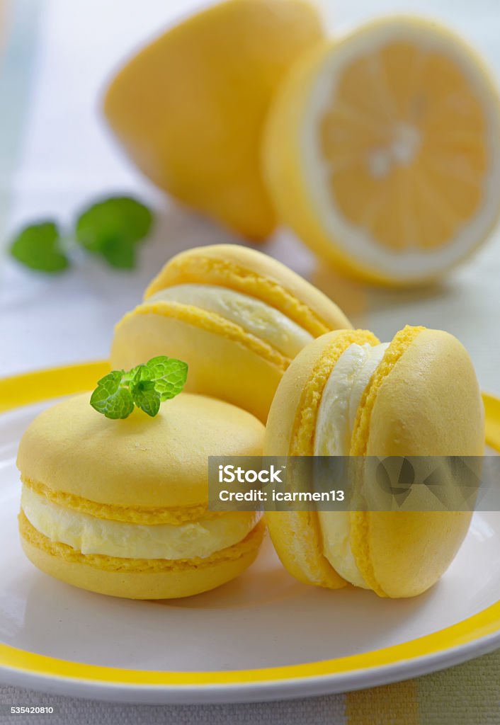 Colorful french macarons with lemon flavor Colorful french macarons Baked Stock Photo