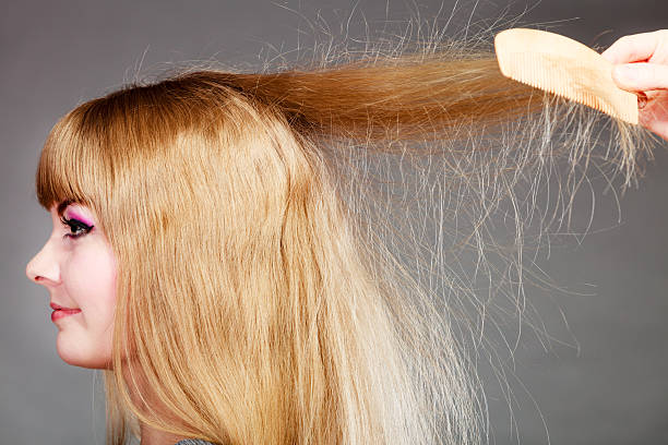 Blonde woman with electrifying hair.