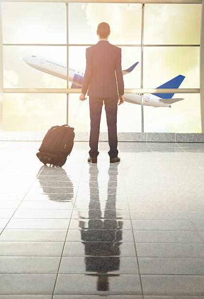 istock traveler in airport on sunset 535424234