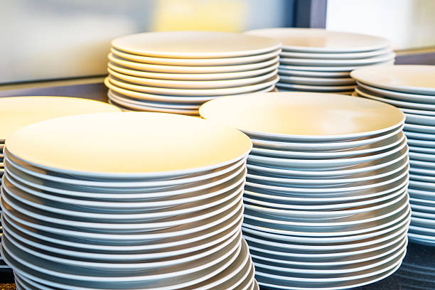 istock Set of white dishes on table 535425474