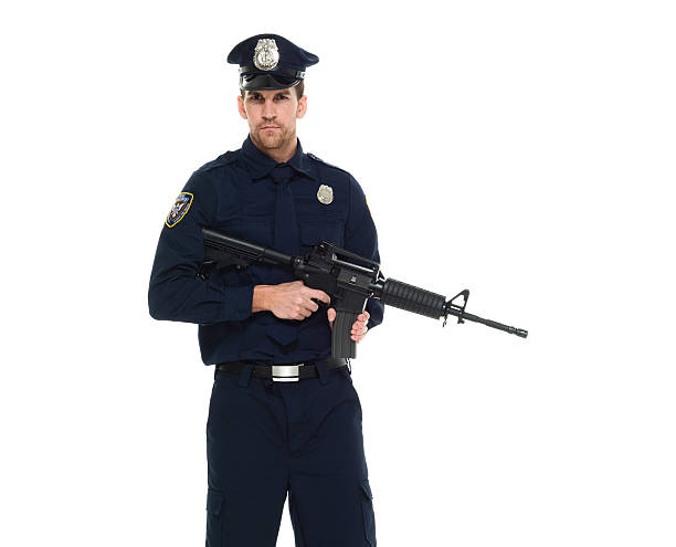 istock Police holding rifle 535425696