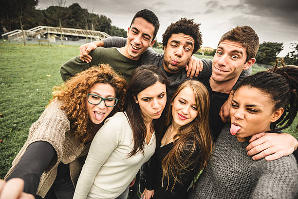 istock Group of college student laughing and doing a selfie 535428987