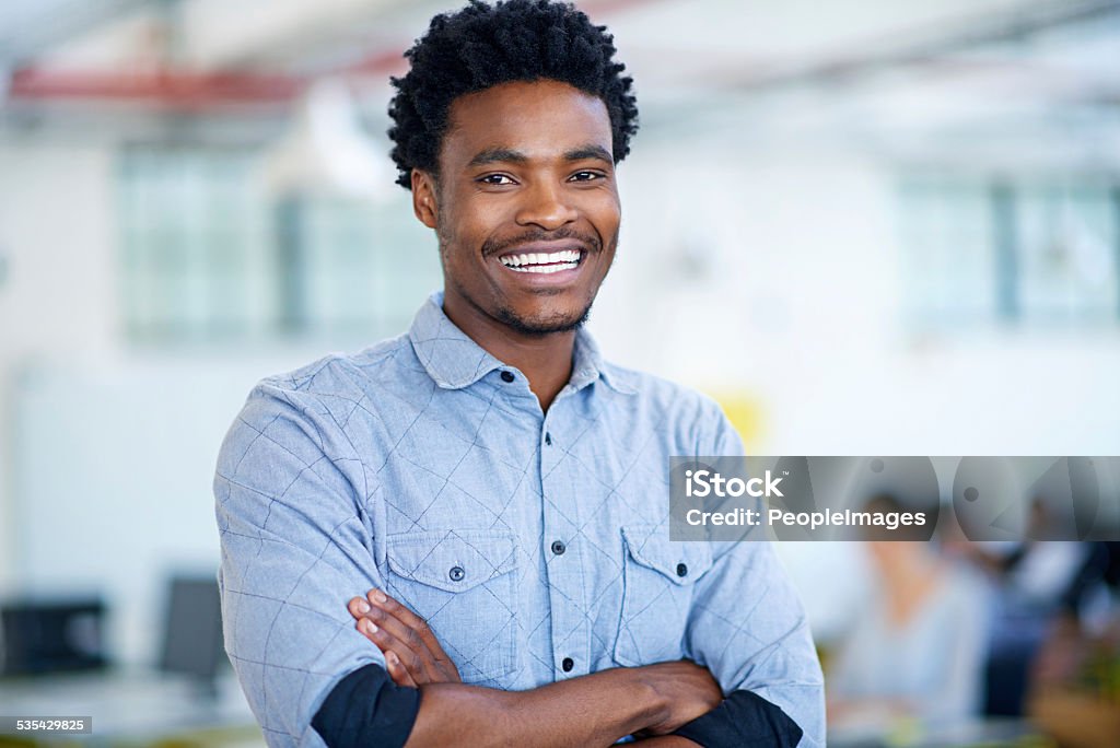 He's confident in his business ability Portrait of a handsome young businessman standing with his arms folded in the officehttp://195.154.178.81/DATA/istock_collage/0/shoots/784845.jpg 2015 Stock Photo