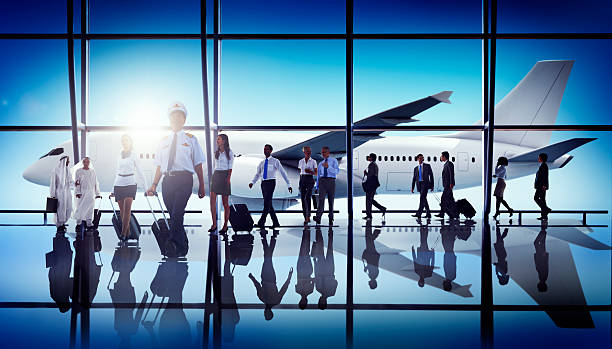 istock Multiethnic Group of Business People with Airplane 535430577