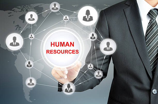 istock Businessman hand pointing on HUMAN RESOURCES sign 535430583