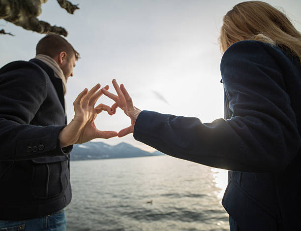 istock Heart shape from couple hands 535430769