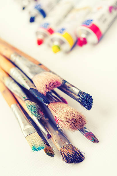 istock paintbrushes closeup and oil multicolor paint tubes 535431723