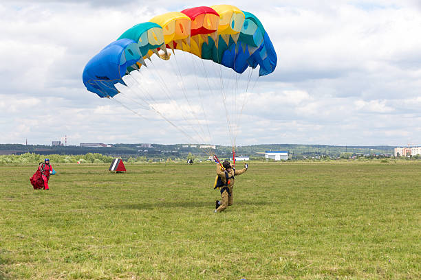 Perm, Russia - June 29, 2014: Skydiver blew bright parachute  at  Festival \