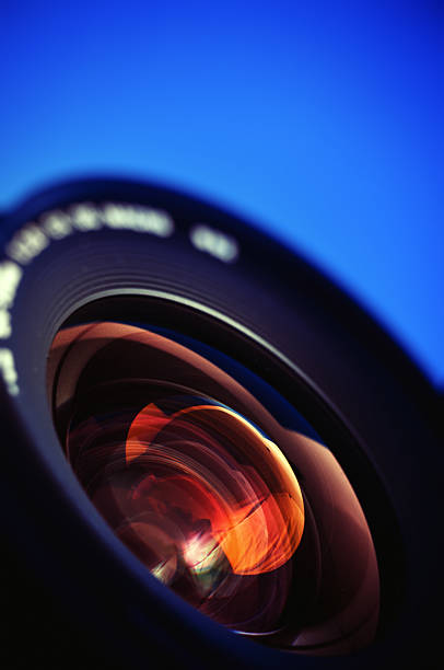 istock Professional photo lens closeup with colorful reflections. 535432597