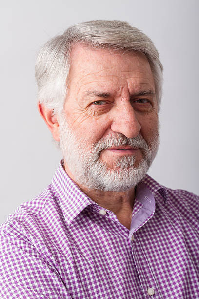 istock Portrait of senior man over a white background 535433113