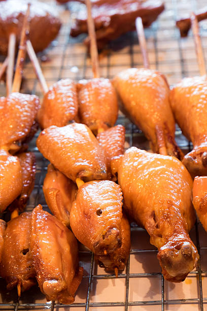 istock Grilled chicken legs on white plate 535444822
