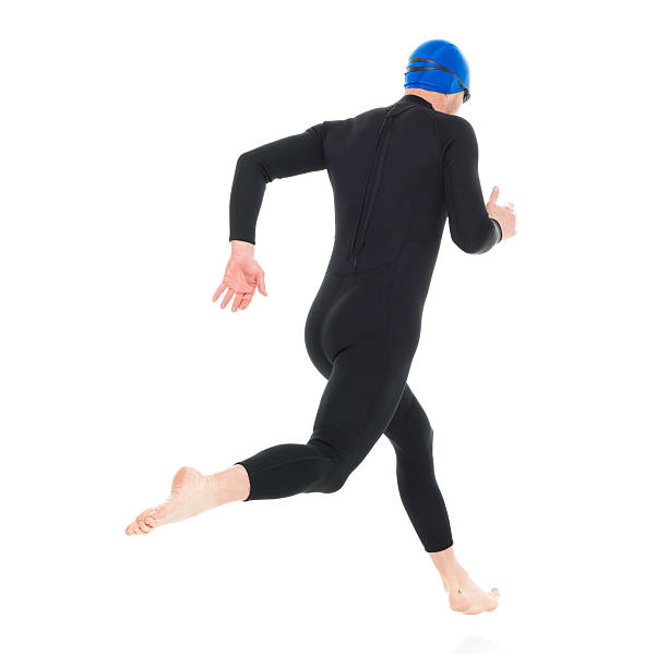 istock Rear view of swimmer running 535445046