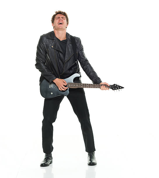 excitación hombre tocando la guitarra - isolated on white studio shot guitar young men fotografías e imágenes de stock