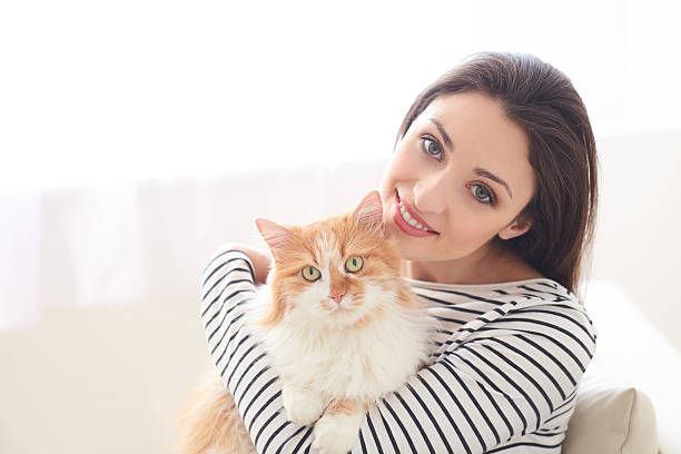 istock Pretty young woman is resting with animal 535446222