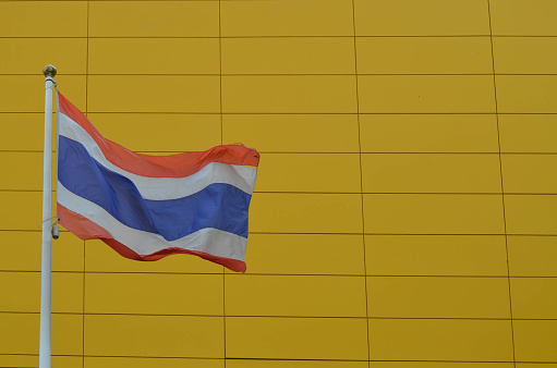 Thai Flag on the yellow background