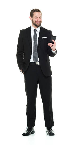 istock Cheerful businessman using phone 535449494